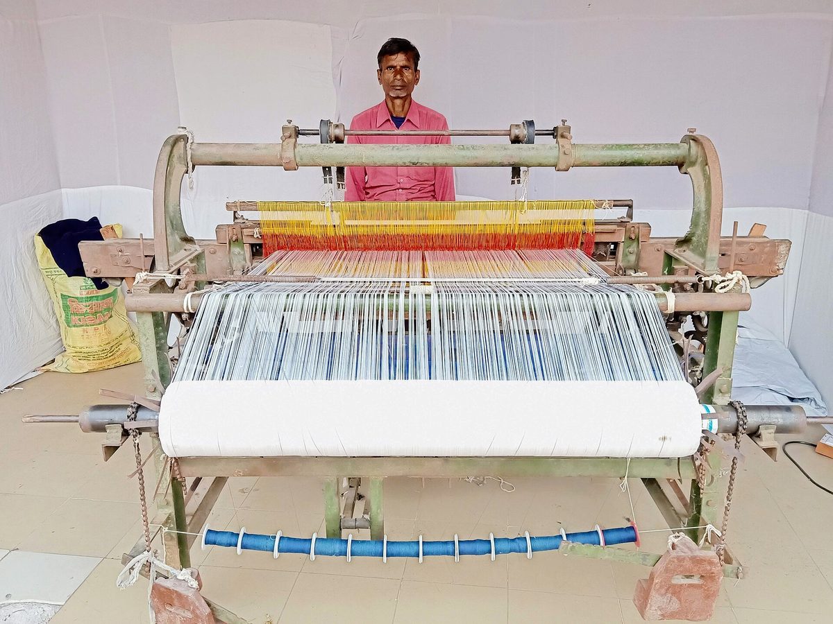 A handloom weaver at work